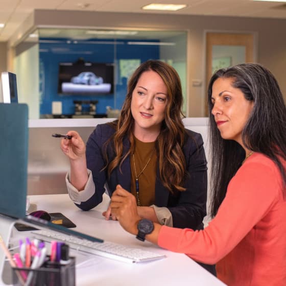 Supply chain professionals analyzing real-time data